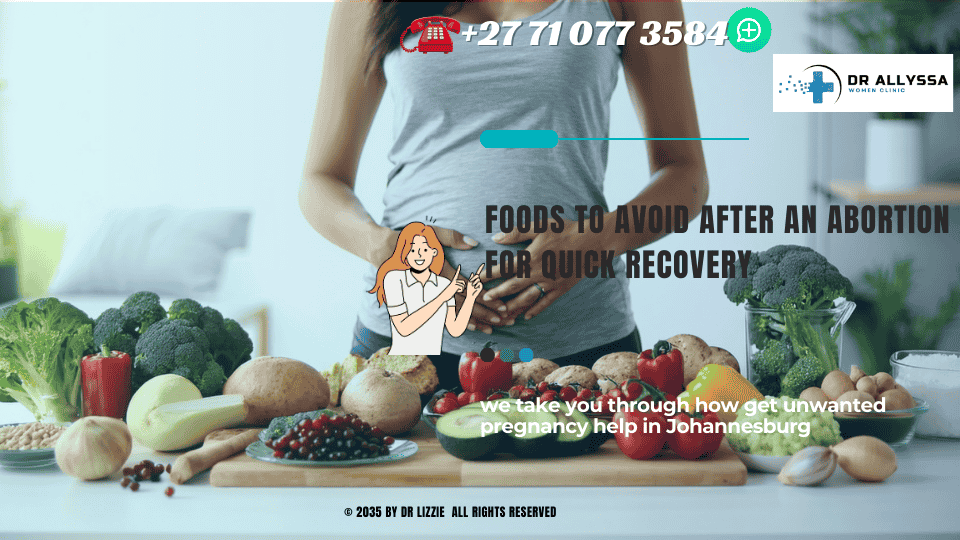 A woman holding her stomach, sitting at a table with a variety of foods, symbolizing the importance of dietary choices after an abortion.